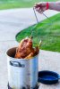 frying-a-whole-turkey-outdoors-royalty-free-image-1637598200.jpg