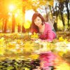 15530067-jeune-jolie-femme-de-repos-dans-le-parc-automne.jpg